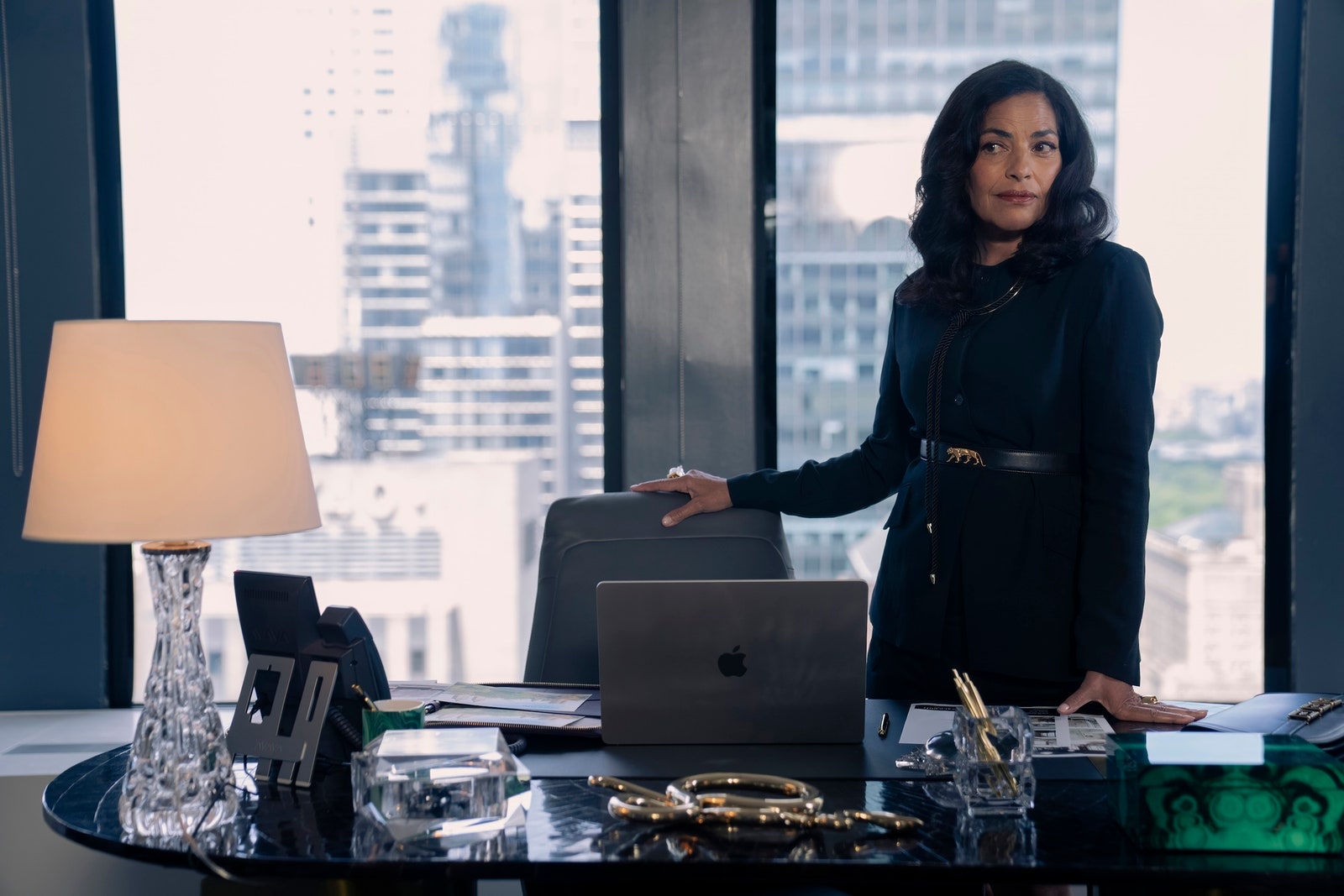 Images may contain Sarita Choudhury executive lamp adult cup table furniture table computer and electronics